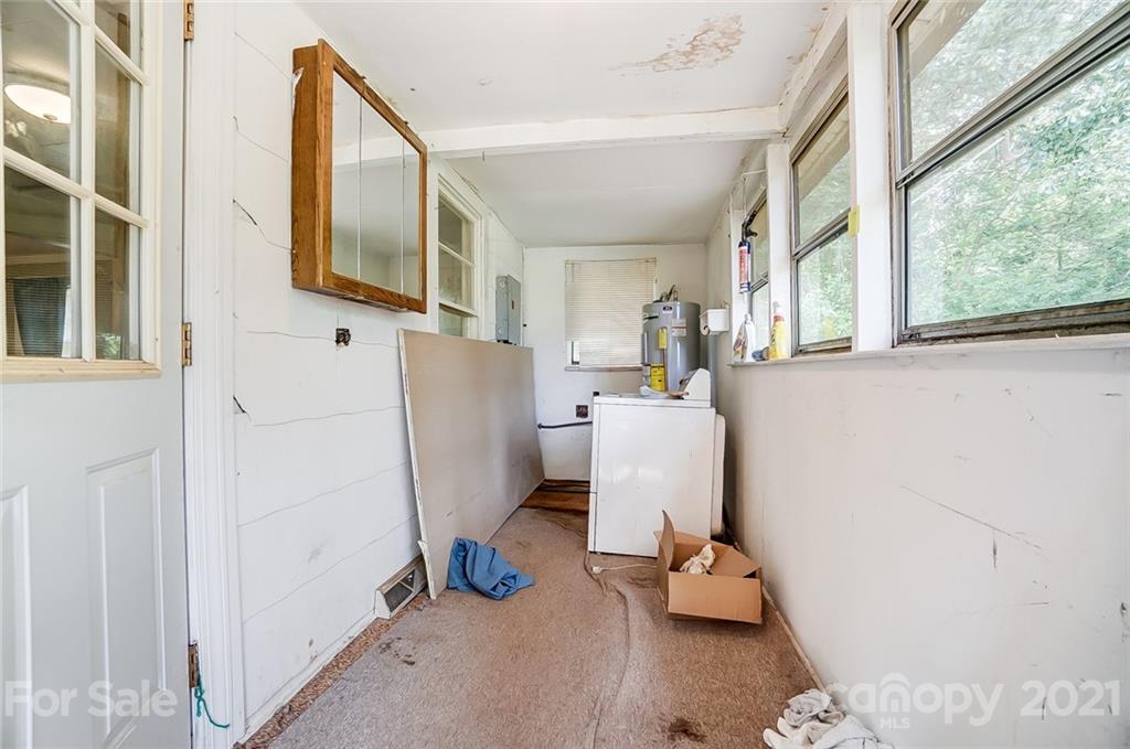 1429 Beth Haven Church Road Denver, NC 28037 - Photo 19 of 27 a living room with furniture and a window