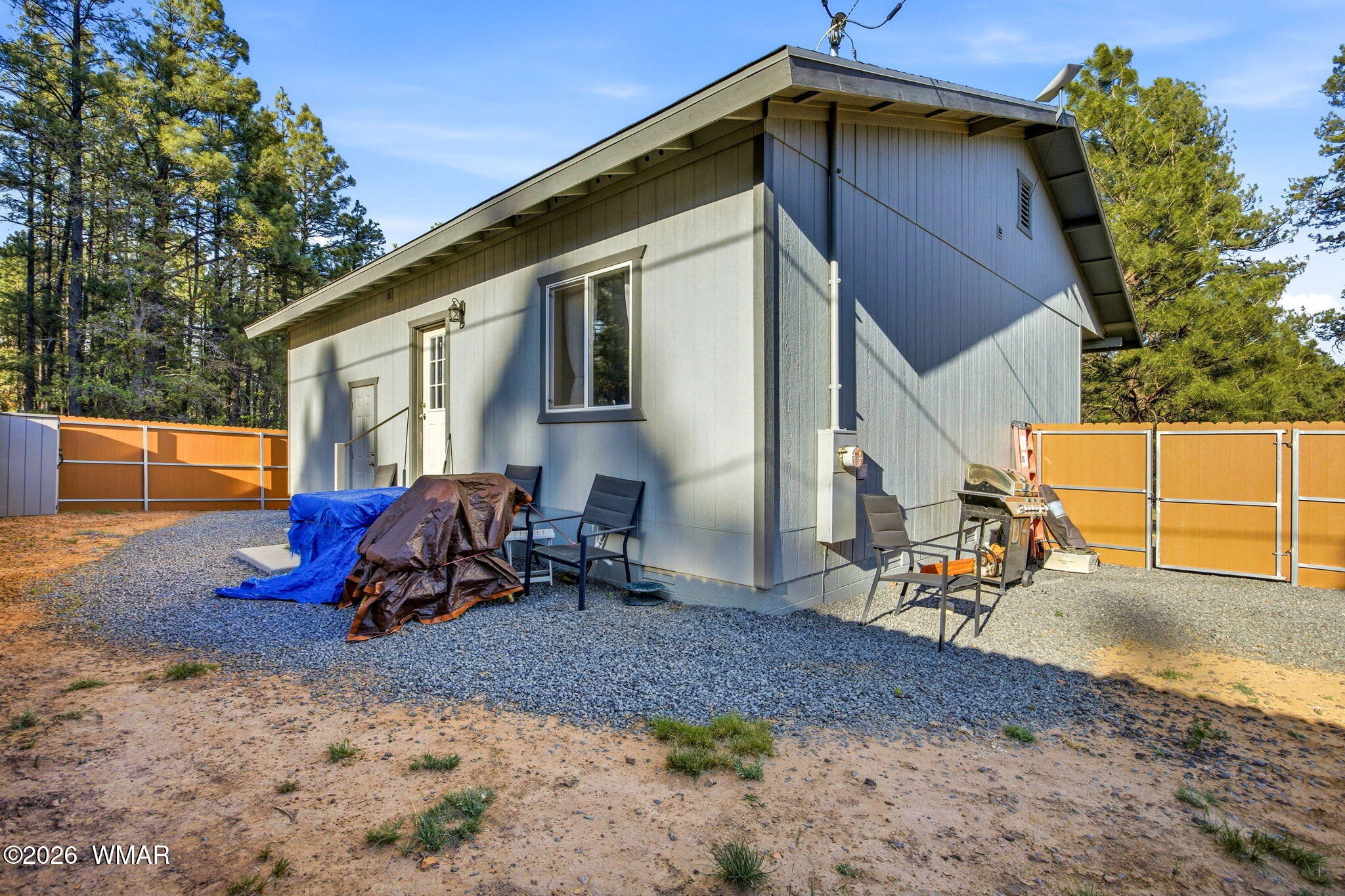 588 Rim Road Pinedale, AZ 85934 - Photo 21 of 30 a view of a house with a patio