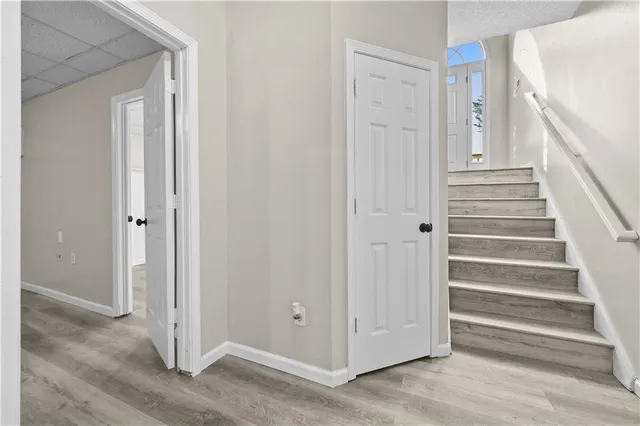 a view of a entryway with wooden floor