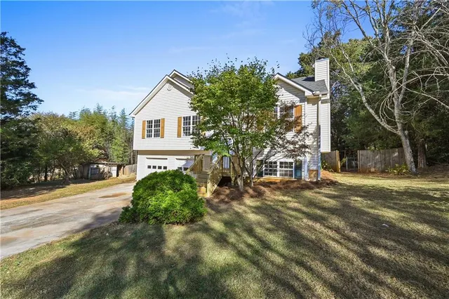a house view with a outdoor space