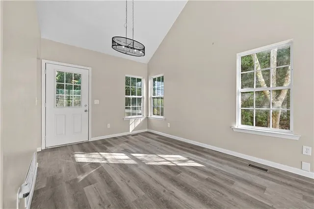 an empty room with windows