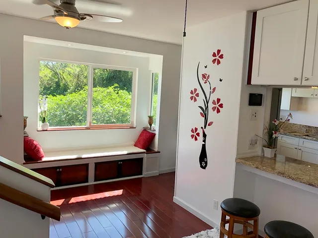 a room with furniture and wooden floor