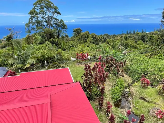 a bedroom with a bed dresser and a window