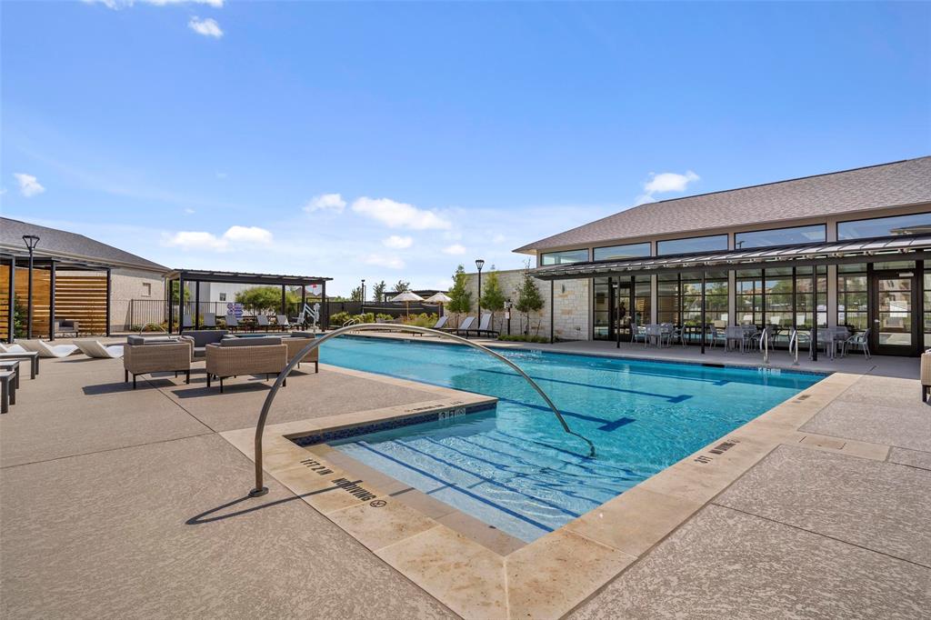 651 Watters Road, Unit 5305 Allen, TX 75013 - Photo 33 of 40 a swimming pool with outdoor seating and yard