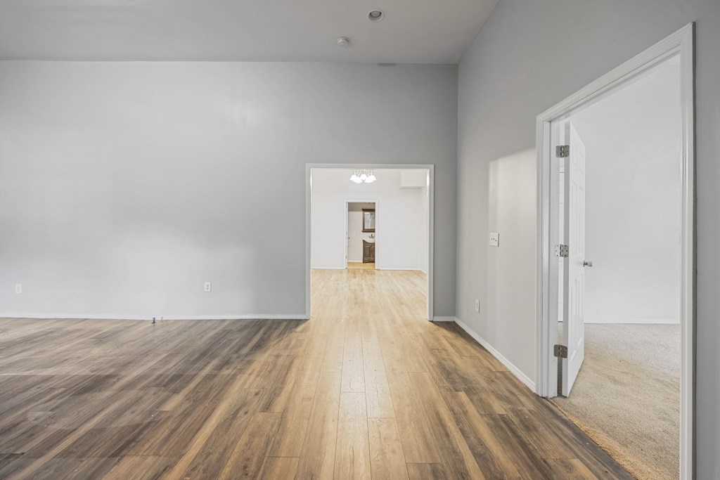 2113 Summerville Road Phenix City, AL 36867 - Photo 13 of 37 a view of a hallway with wooden floor