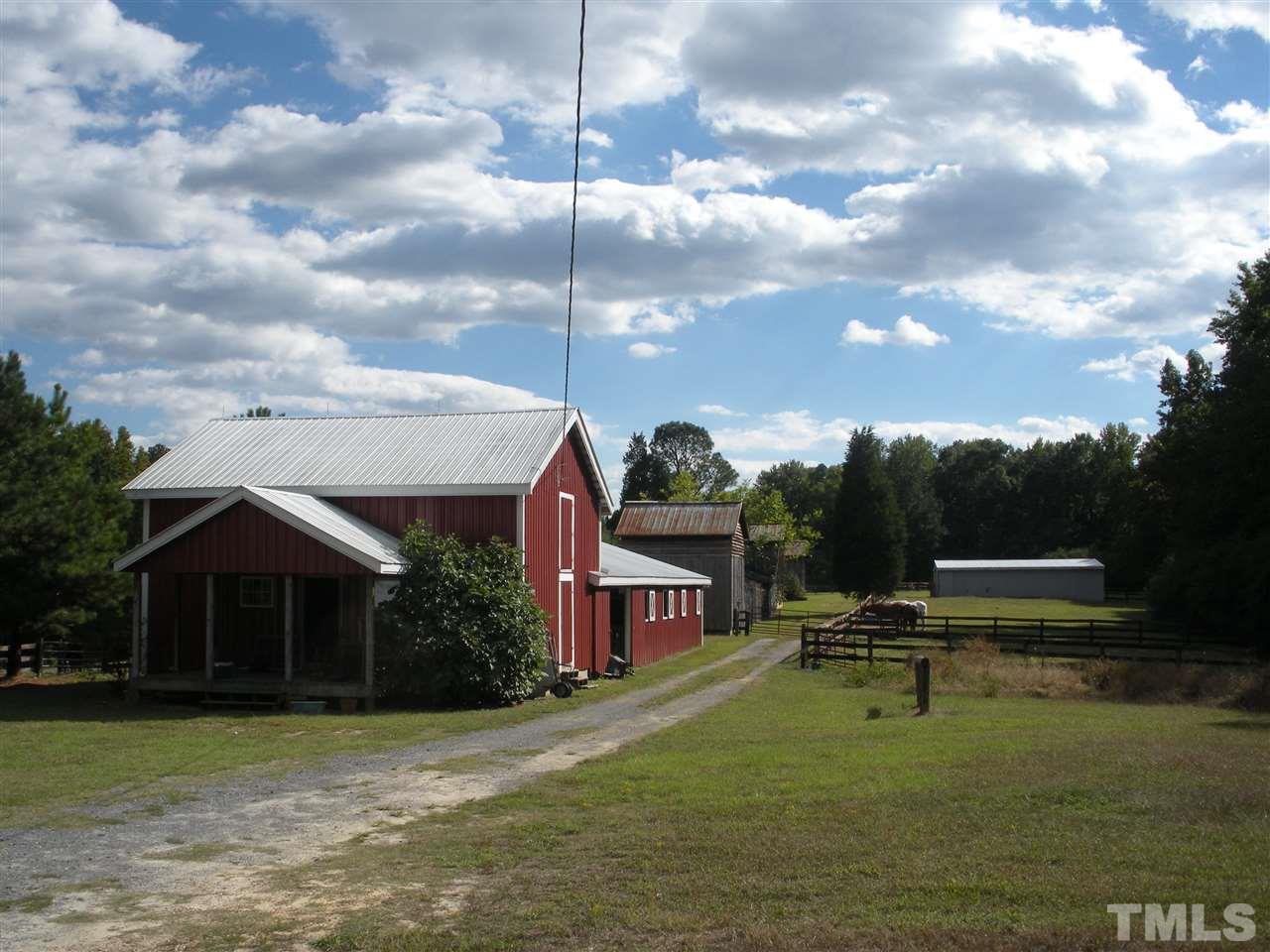 0 Castleberry Road Apex, NC 27523 - Photo 9 of 13 a swimming pool with outdoor seating yard and barbeque oven