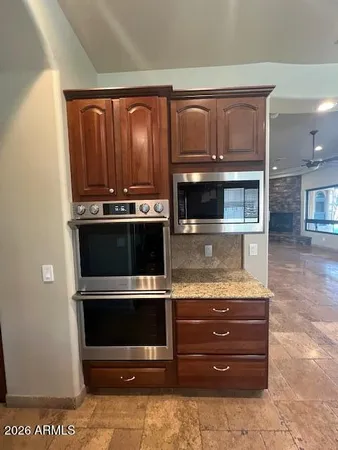 a bathroom with a sink double vanity and a mirror