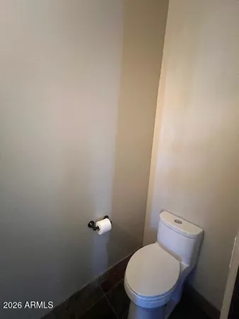 a large bathroom with a large tub and sink