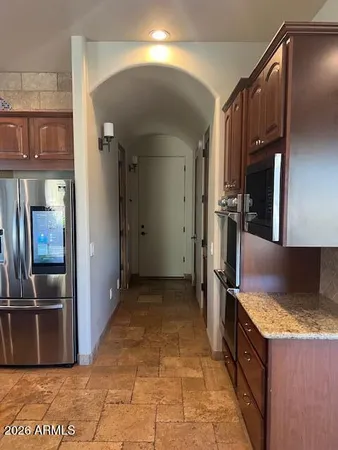 a bathroom with a bathtub and a window