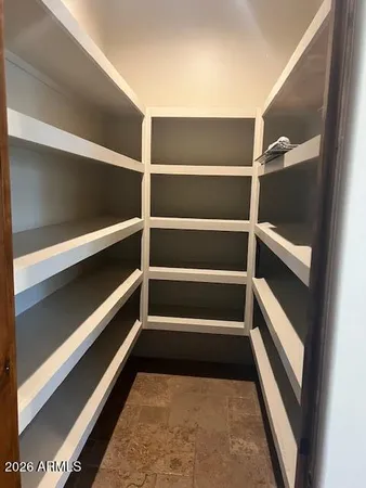 a bathroom with a toilet and a sink