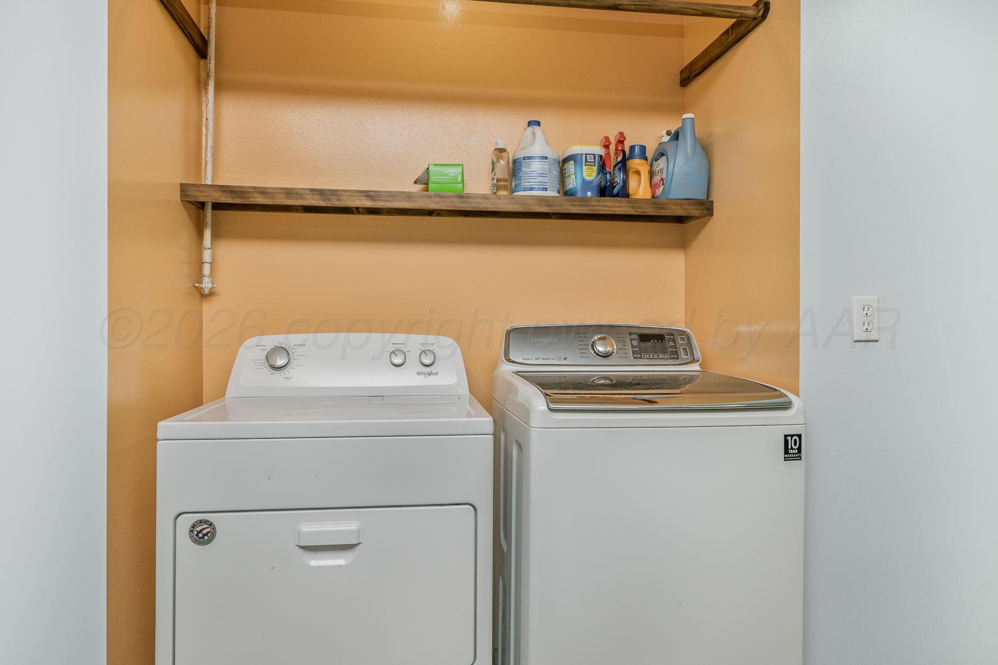 5305 Randolph Road Amarillo, TX 79106 - Photo 15 of 20 a utility room with dryer and washer