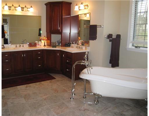 130 Linton Road Fredericktown, PA 15333 - Photo 15 of 18 Master Bath/Spa. The master bath is to die for! This modern day claw foot tub is perfect for an evening soak. There is also a separate walk in shower. The master bedroom suite also boasts a large walk in closet and plenty of storage.