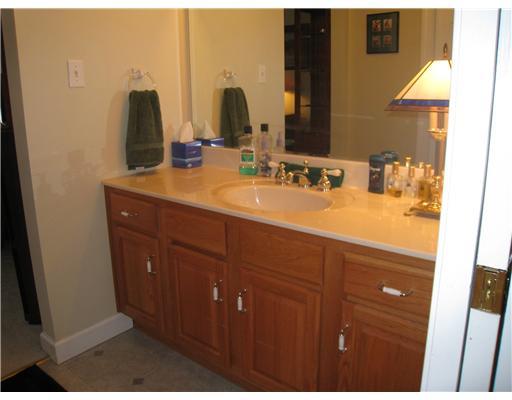 130 Linton Road Fredericktown, PA 15333 - Photo 18 of 18 Full Bath. This bathroom adjoins bedroom three. It boasts lovely oak cabinetry and plenty of storage.