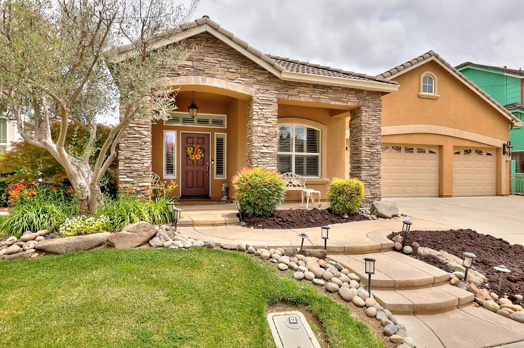 4152 Post Oak Drive Turlock, CA 95382 - Photo 5 of 71 front view of a house with a rug