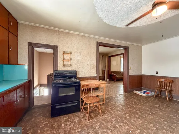 a view of a livingroom with furniture window and wooden floor