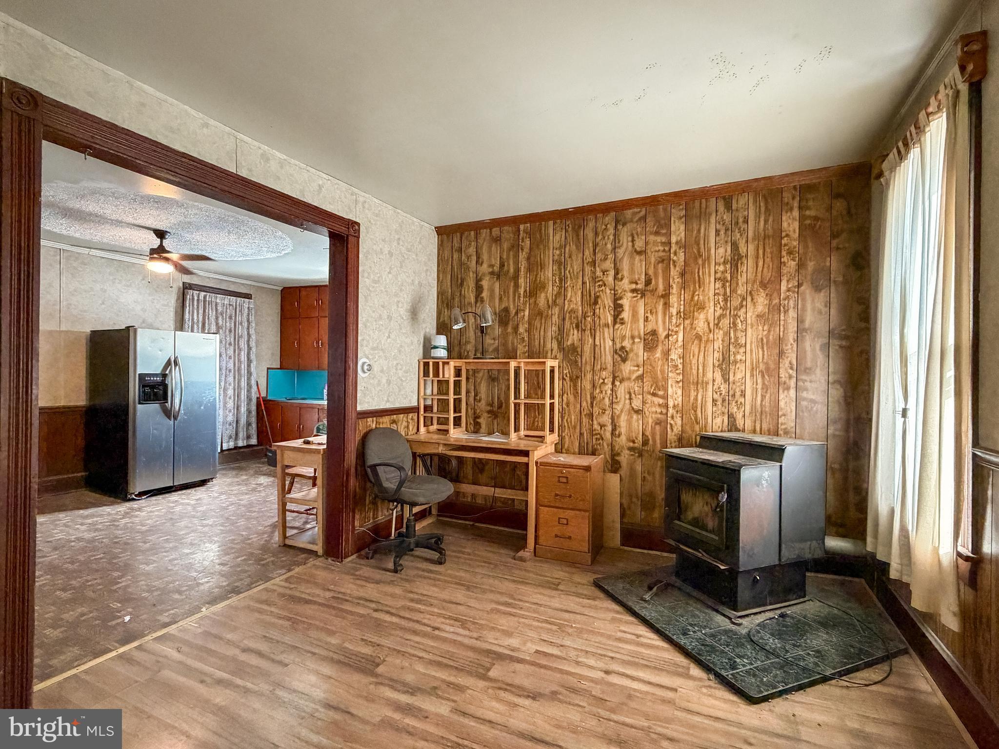 130 East 1st Street Everett, PA 15537 - Photo 14 of 39 a view of a livingroom with furniture and a fireplace