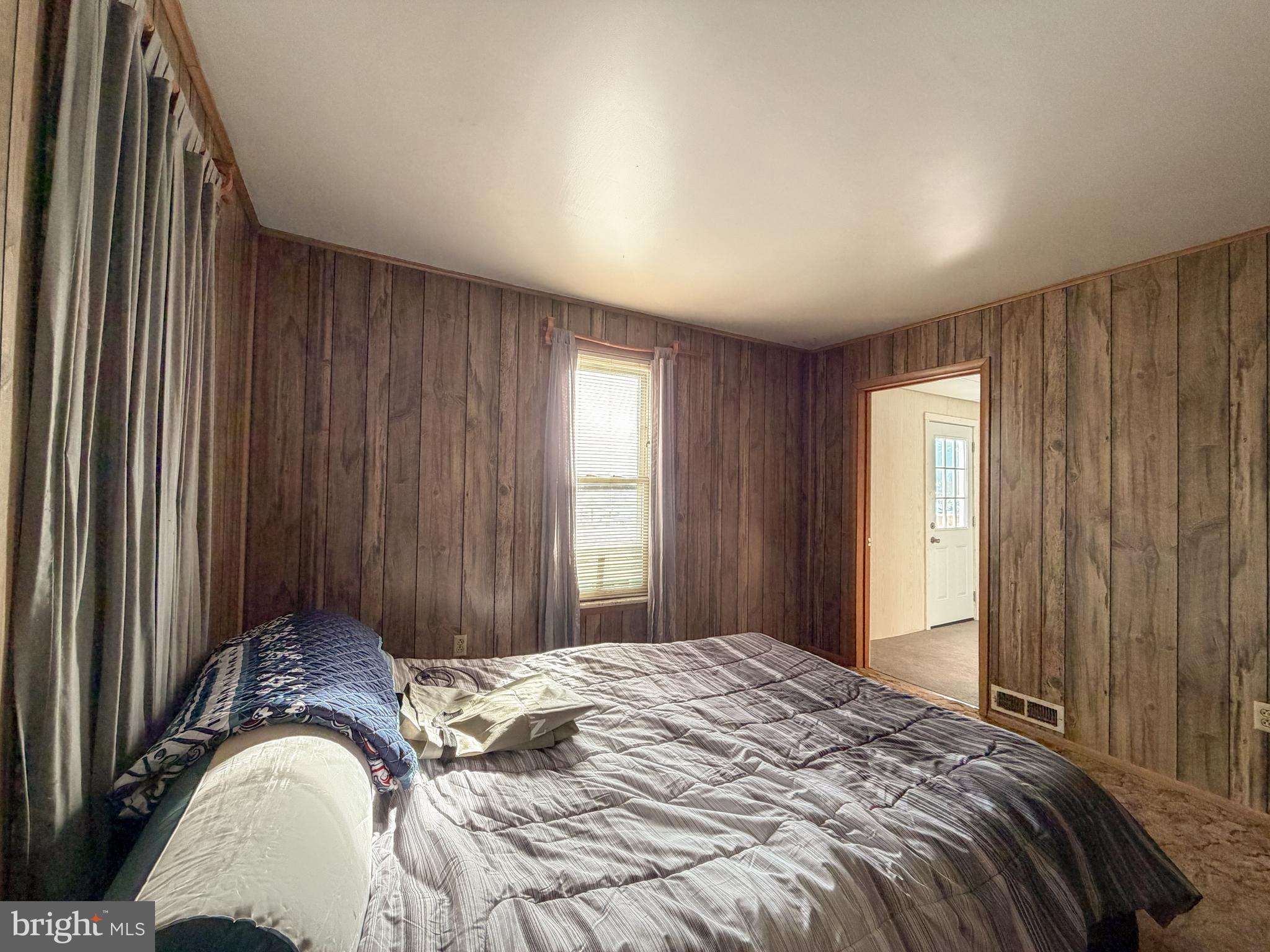 130 East 1st Street Everett, PA 15537 - Photo 19 of 39 a bedroom with a bed and a window