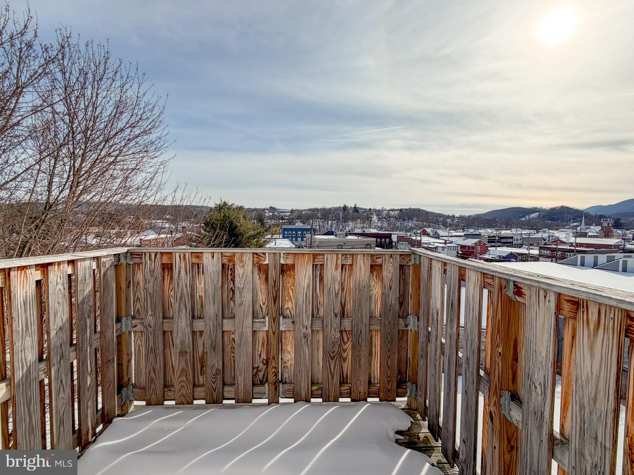 130 East 1st Street Everett, PA 15537 - Photo 21 of 39 a view of a street with wooden fence