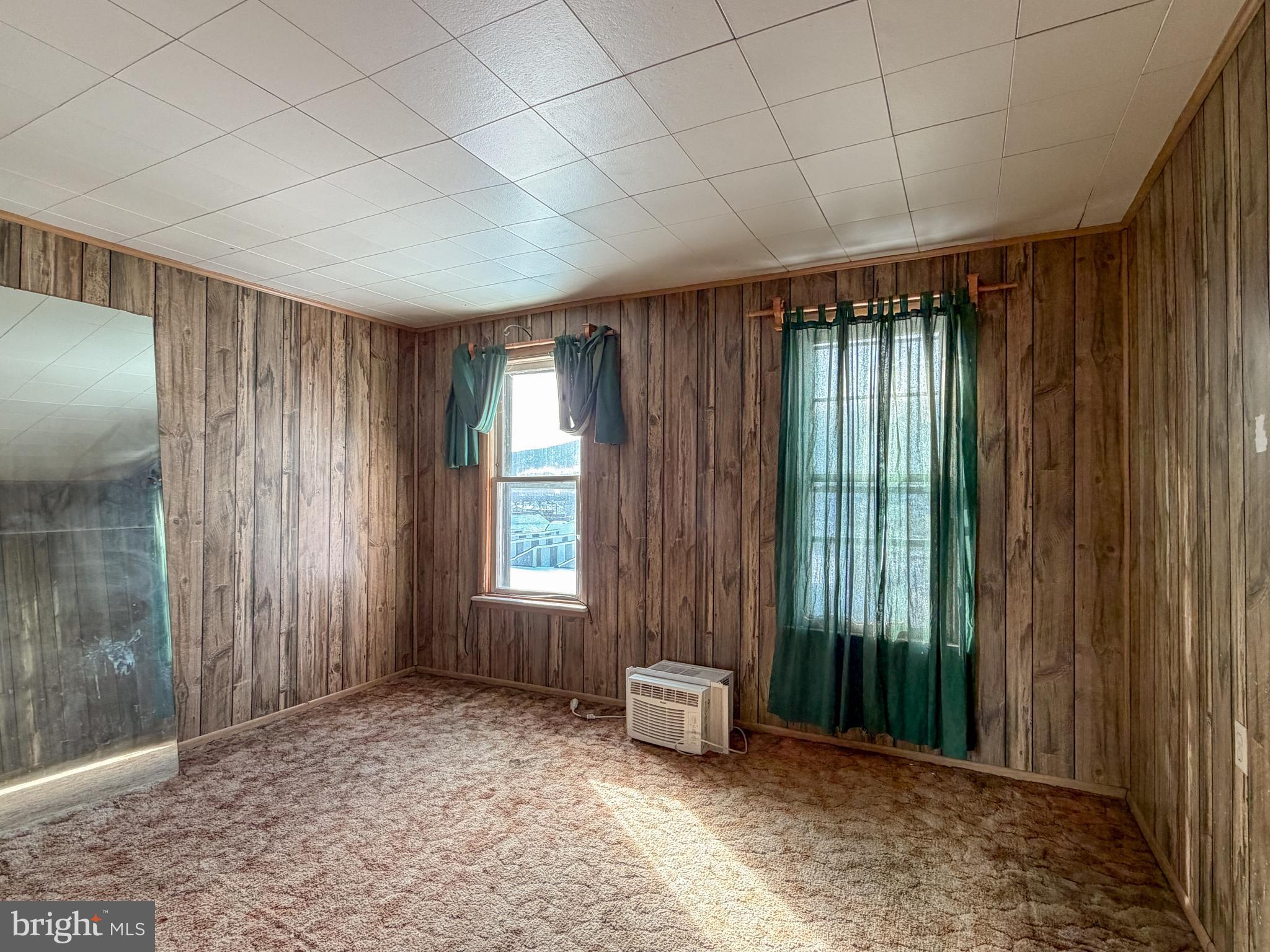 130 East 1st Street Everett, PA 15537 - Photo 25 of 39 an empty room with windows and closet