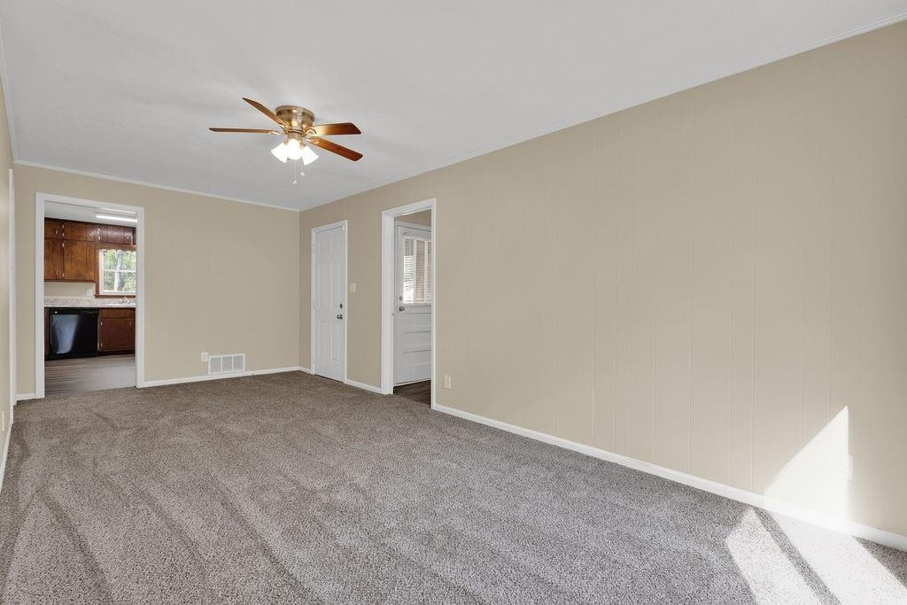 2739 Council Street Lithonia, GA 30058 - Photo 13 of 31 a view of an empty room with chandelier fan