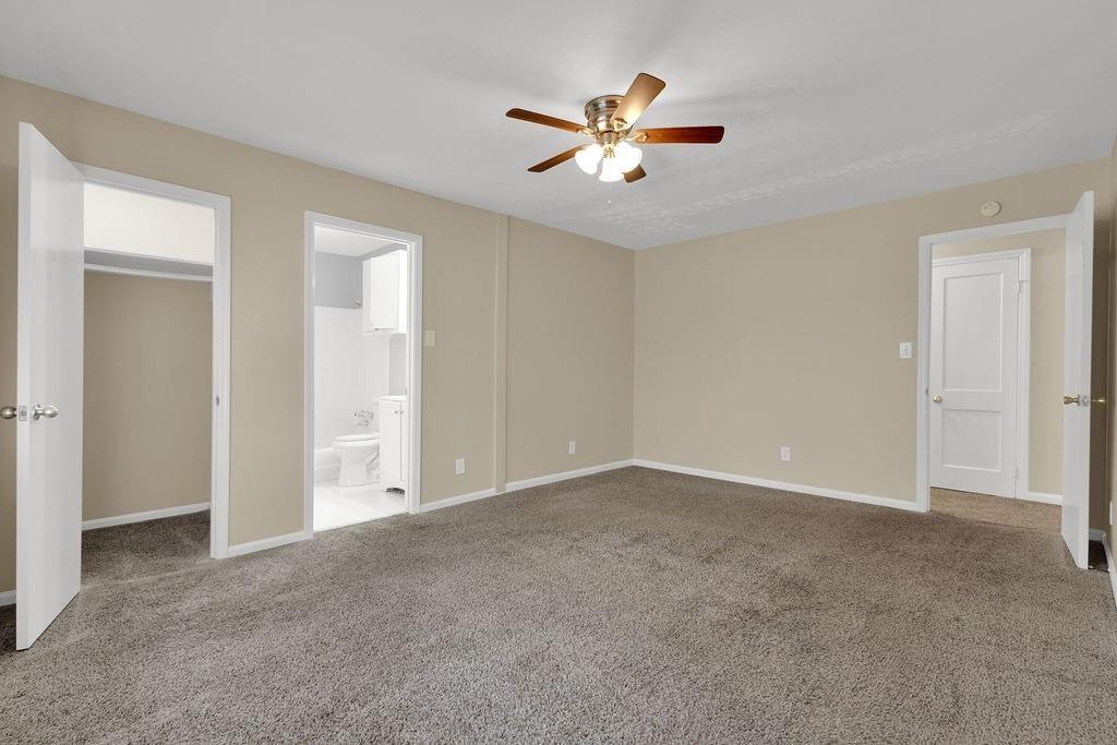 2739 Council Street Lithonia, GA 30058 - Photo 20 of 31 a view of an empty room with chandelier fan