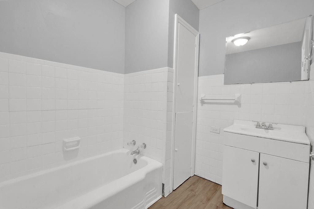 2739 Council Street Lithonia, GA 30058 - Photo 25 of 31 a bathroom with a sink and a bathtub