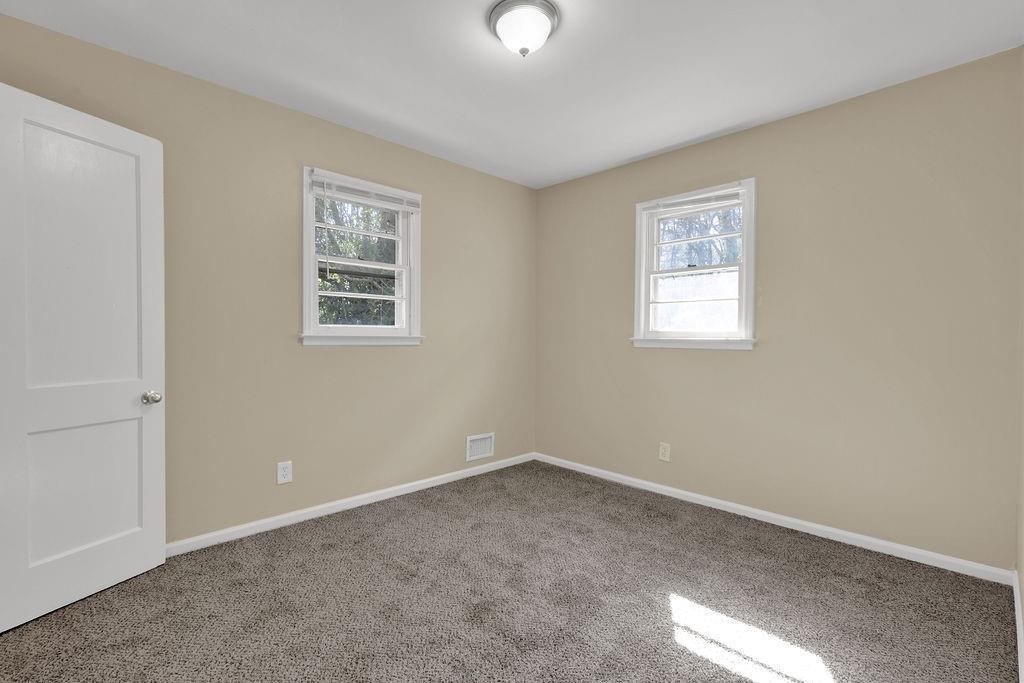 2739 Council Street Lithonia, GA 30058 - Photo 28 of 31 a view of a room that has a window in it