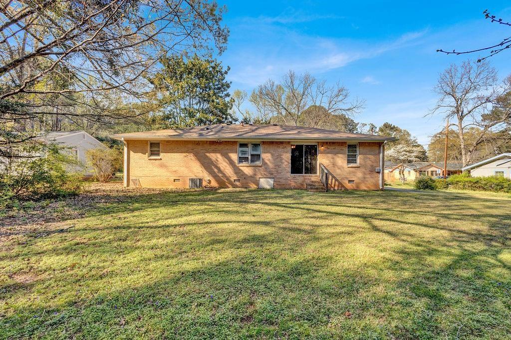 2739 Council Street Lithonia, GA 30058 - Photo 29 of 31 a front view of a house with a ocean view