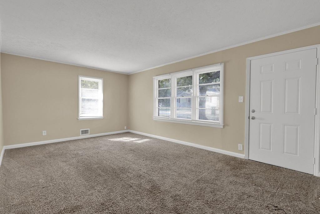 2739 Council Street Lithonia, GA 30058 - Photo 4 of 31 a view of an empty room with a window