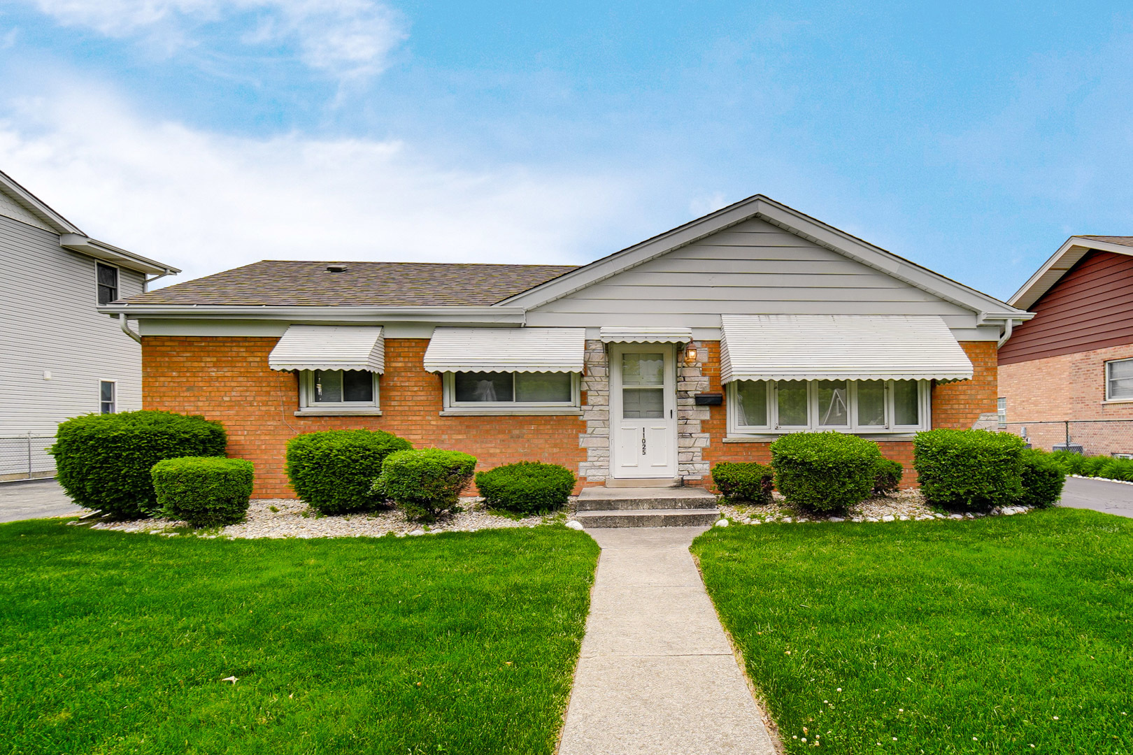 11025 Princess Avenue Chicago Ridge, IL 60415 - Photo 1 of 21 a front view of a house with a yard and green space