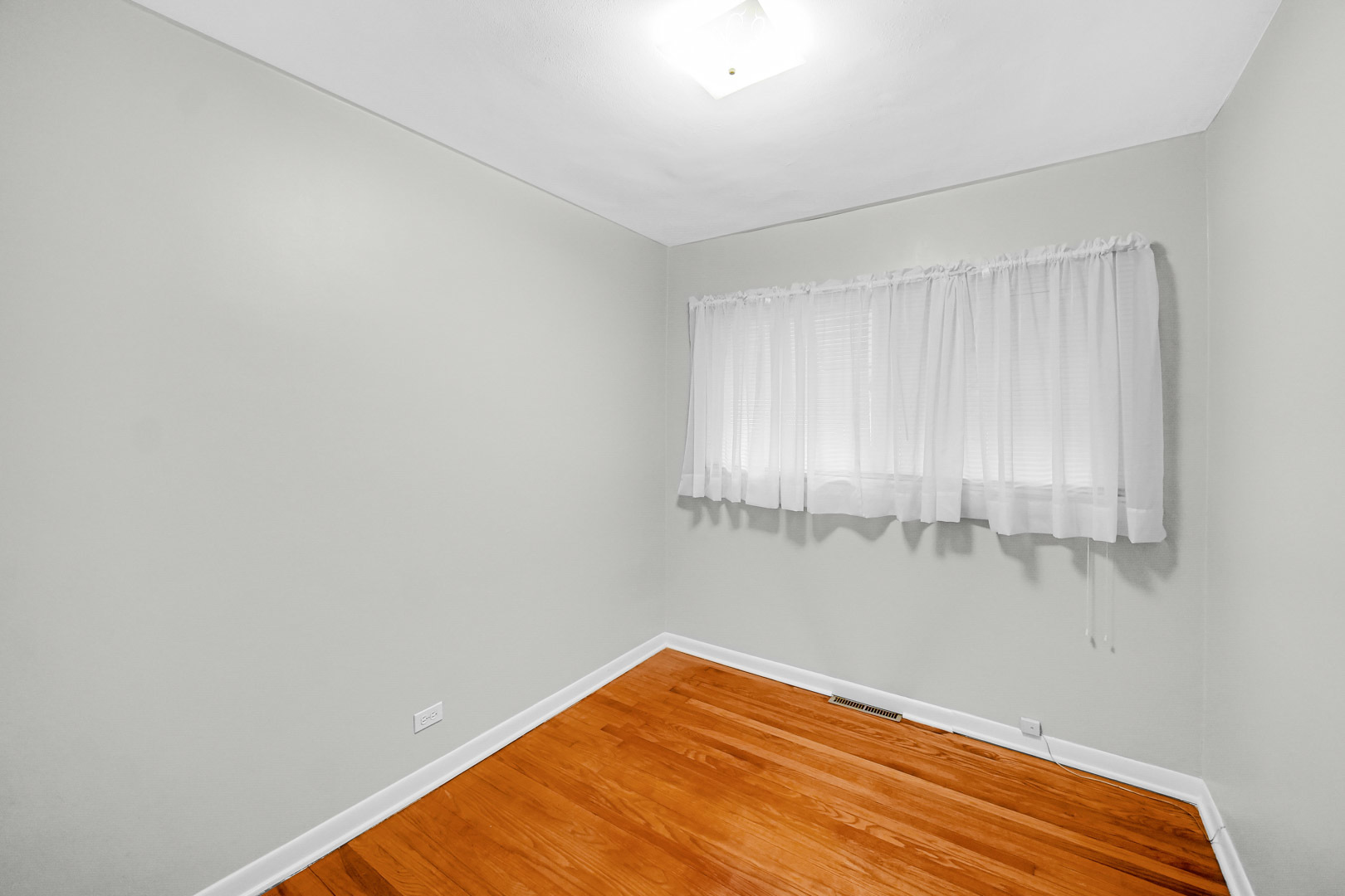 11025 Princess Avenue Chicago Ridge, IL 60415 - Photo 16 of 21 a view of a room with racks on the wall