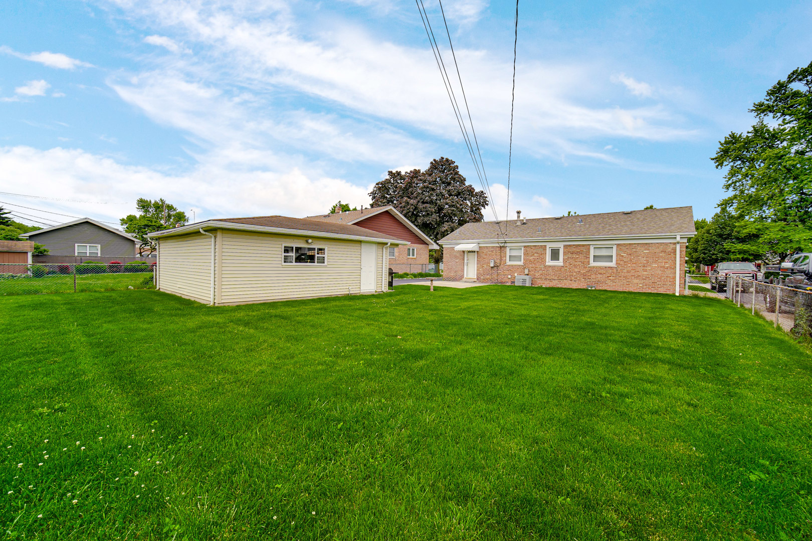 11025 Princess Avenue Chicago Ridge, IL 60415 - Photo 6 of 21 a view of a house with a backyard