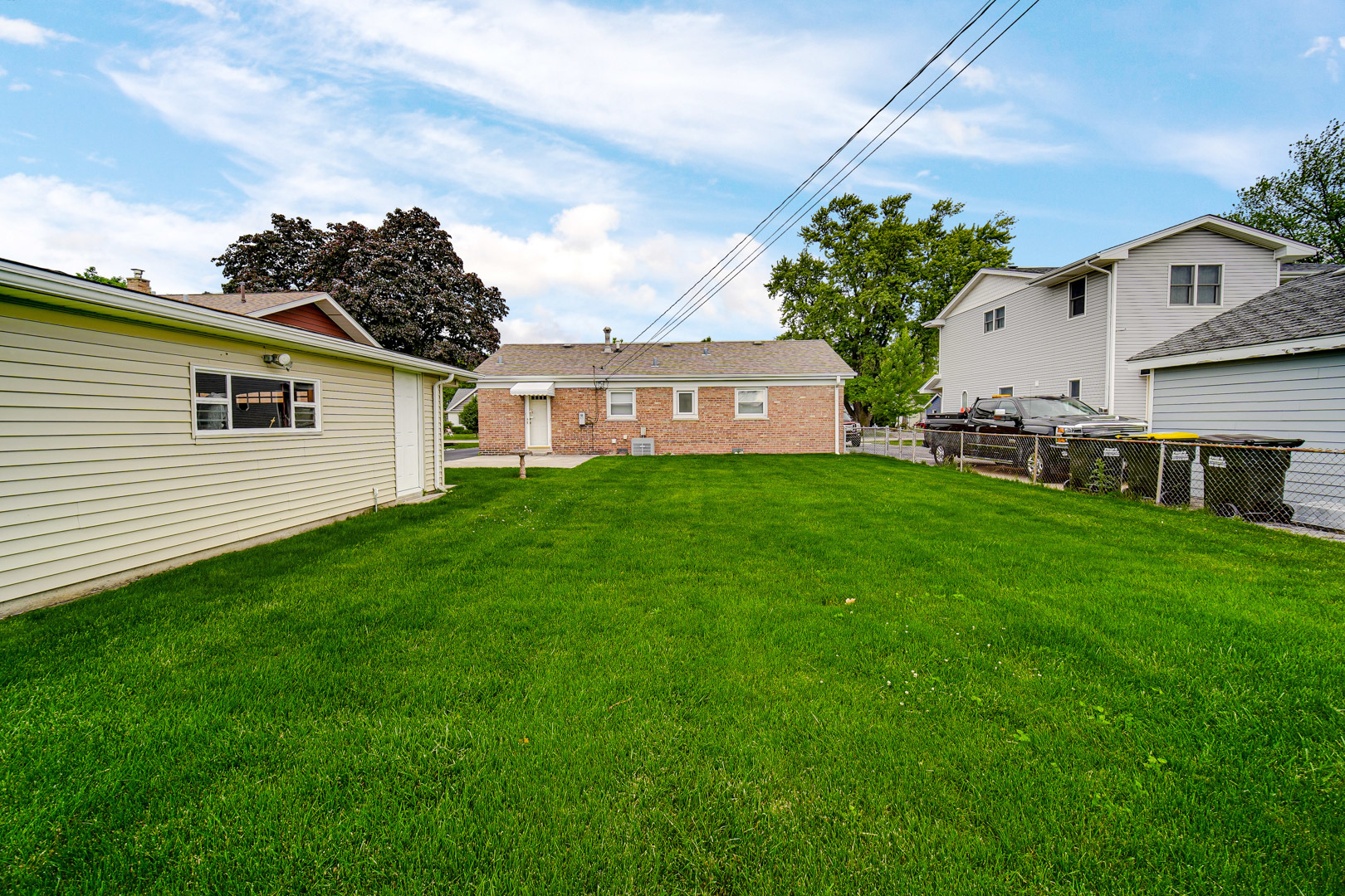 11025 Princess Avenue Chicago Ridge, IL 60415 - Photo 7 of 21 a view of a house with a backyard