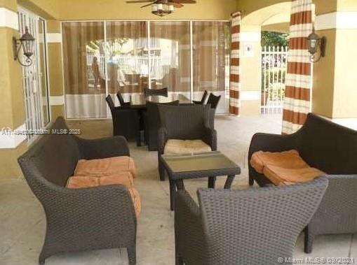 Pinehurst Club Condominiums Hollywood, FL 33021 - Photo 7 of 22 a outdoor dining space with furniture and outdoor view