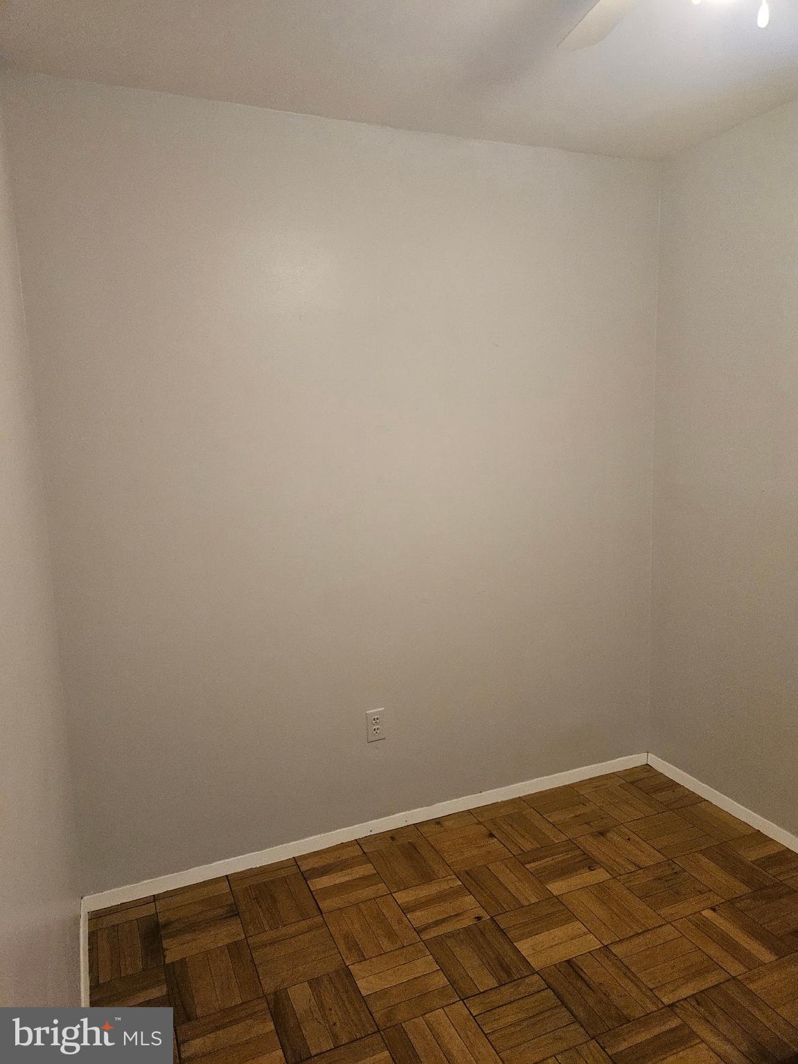 905 Lindsay Road Oxon Hill, MD 20745 - Photo 19 of 31 a view of a room with an empty space and a window