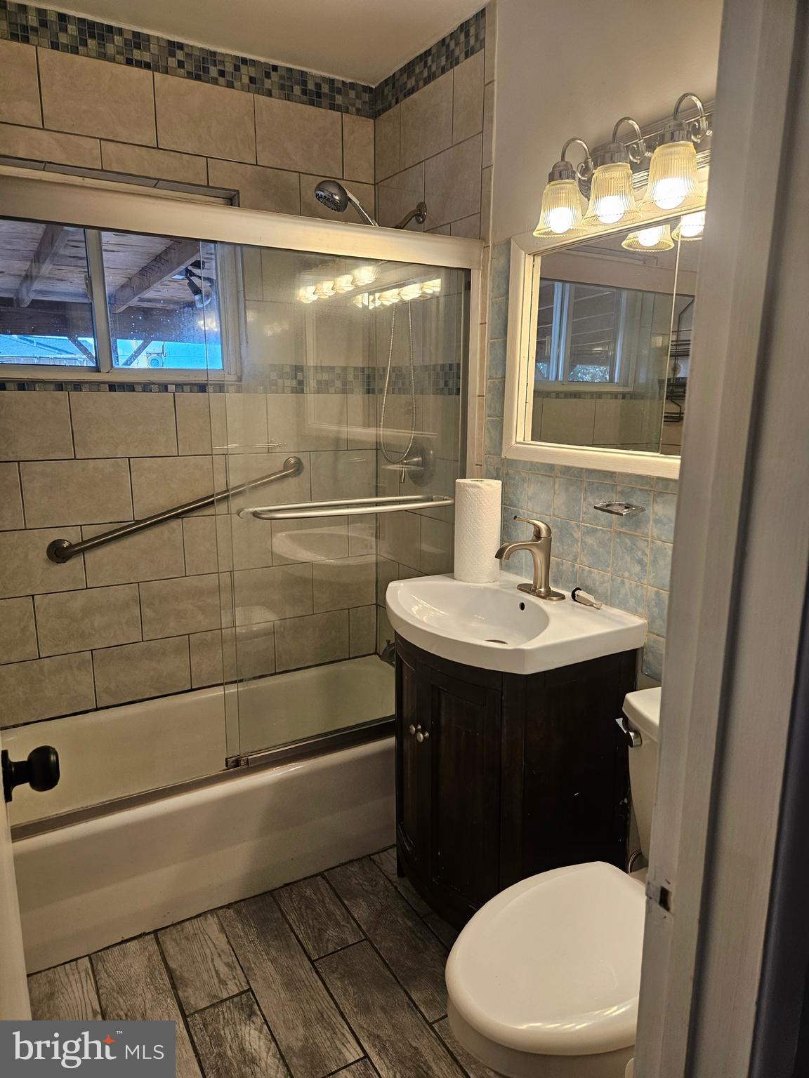 905 Lindsay Road Oxon Hill, MD 20745 - Photo 23 of 31 a bathroom with a sink a toilet and shower