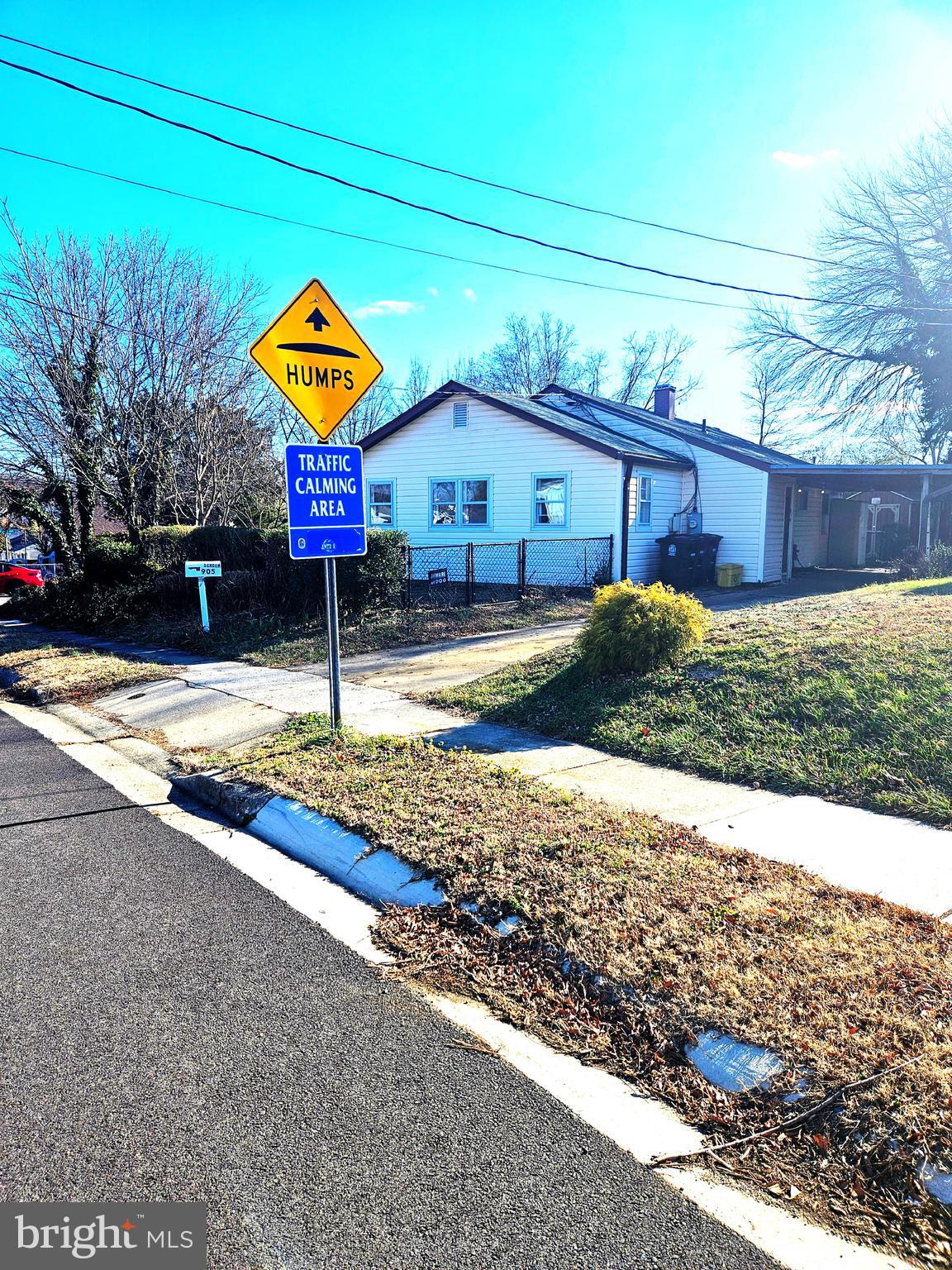 905 Lindsay Road Oxon Hill, MD 20745 - Photo 26 of 31 a view of a street with wooden fence
