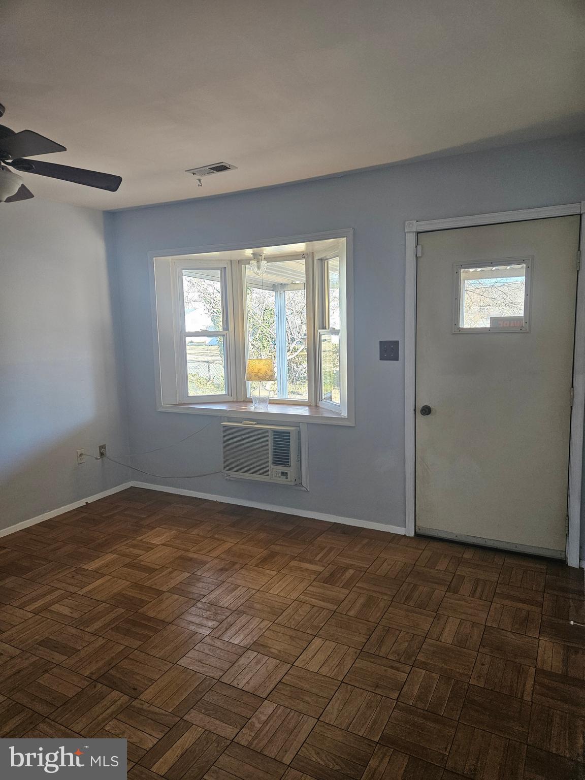 905 Lindsay Road Oxon Hill, MD 20745 - Photo 3 of 31 a view of an empty room with a window