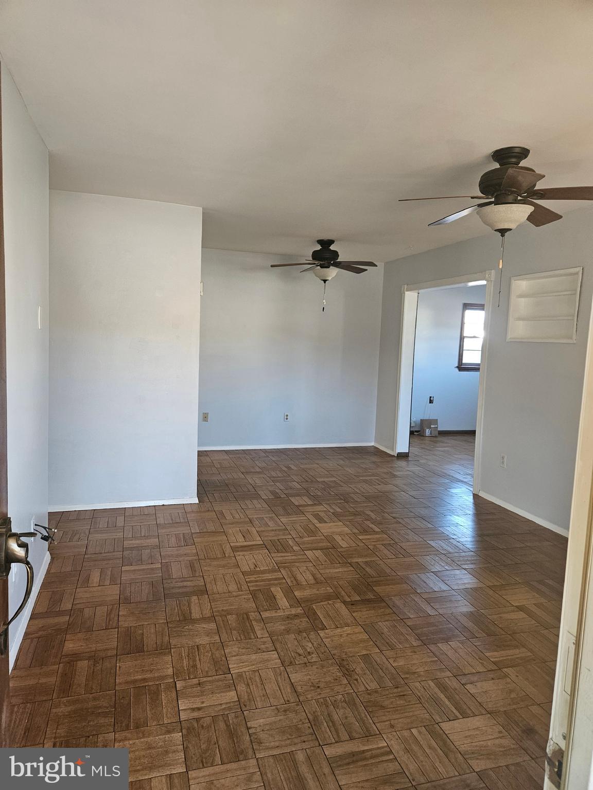905 Lindsay Road Oxon Hill, MD 20745 - Photo 5 of 31 a view of a hallway with a chandelier