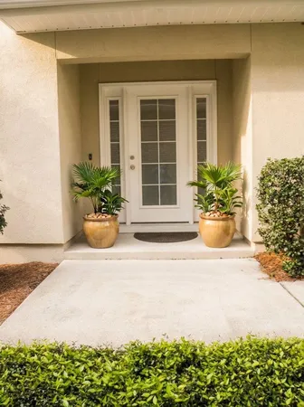 a front view of a house having yard