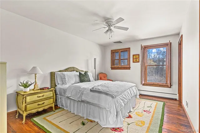 a bathroom with a sink a mirror and a shower