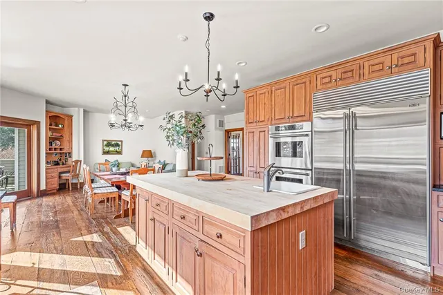 a open kitchen with sink cabinets and stove