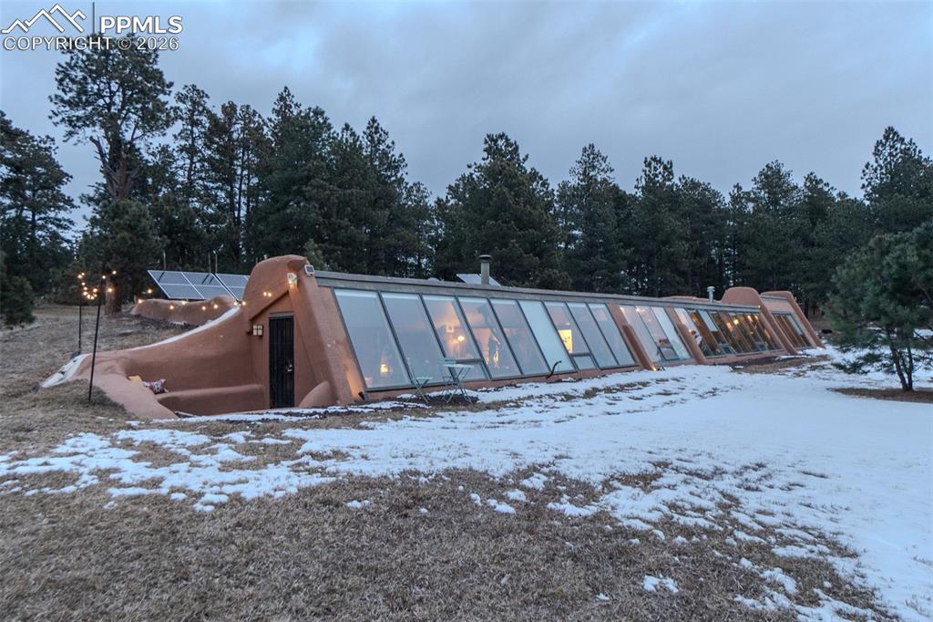 17160 Goshawk Road Colorado Springs, CO 80908 - Photo 34 of 43 a view of outdoor space with seating area