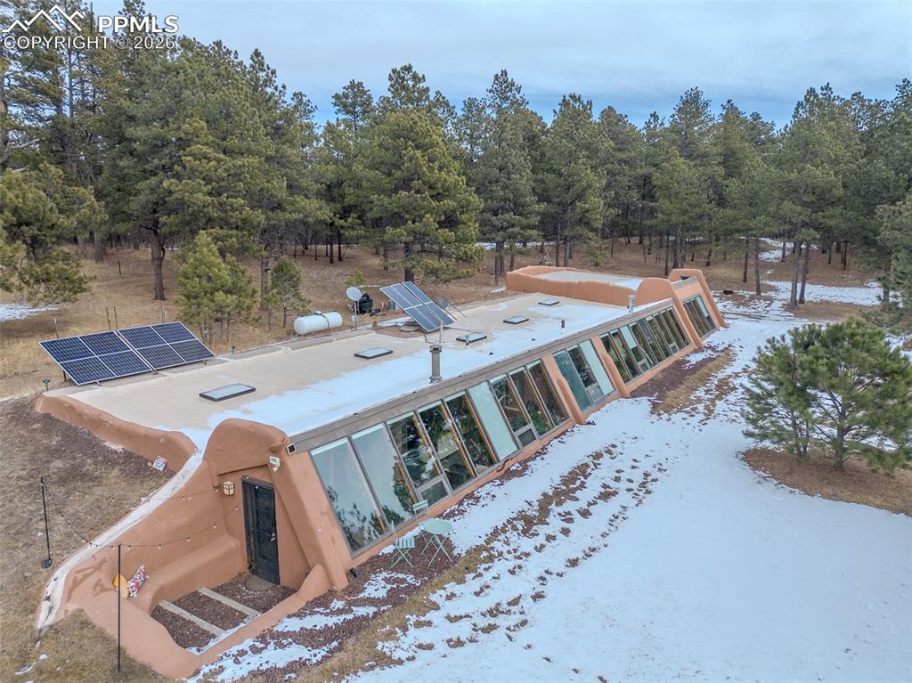17160 Goshawk Road Colorado Springs, CO 80908 - Photo 4 of 43 an aerial view of a house with outdoor space