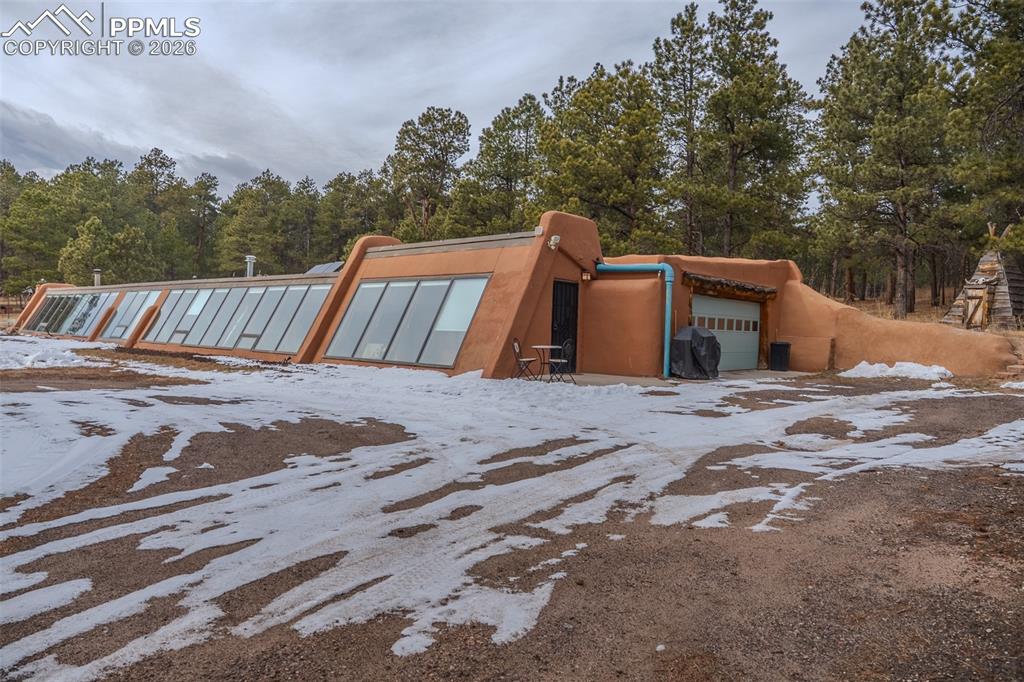17160 Goshawk Road Colorado Springs, CO 80908 - Photo 5 of 43 a view of balcony with wooden floor and outdoor space