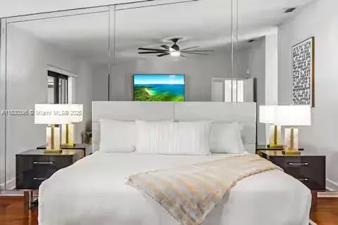 a outdoor living space with furniture and a potted plant