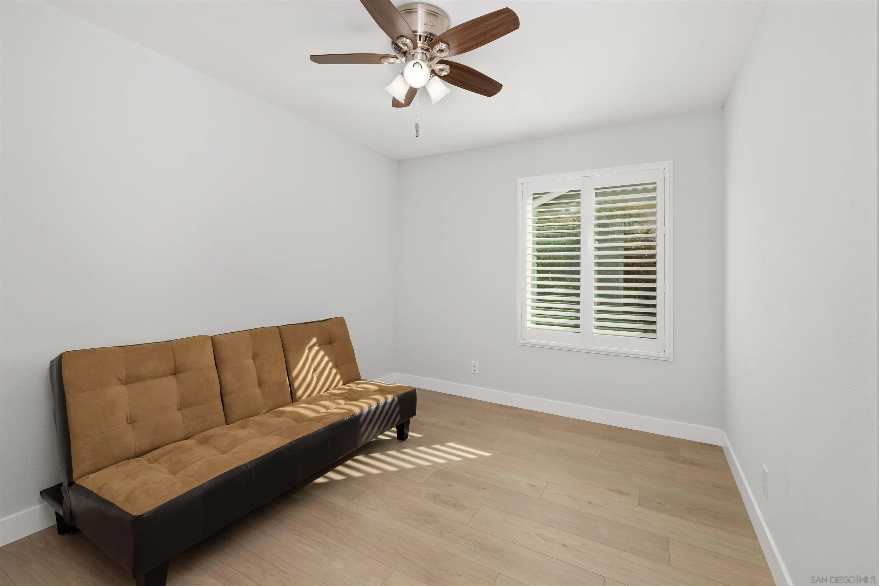12866 Summerfield Lane Poway, CA 92064 - Photo 15 of 33 a living room with furniture and a window