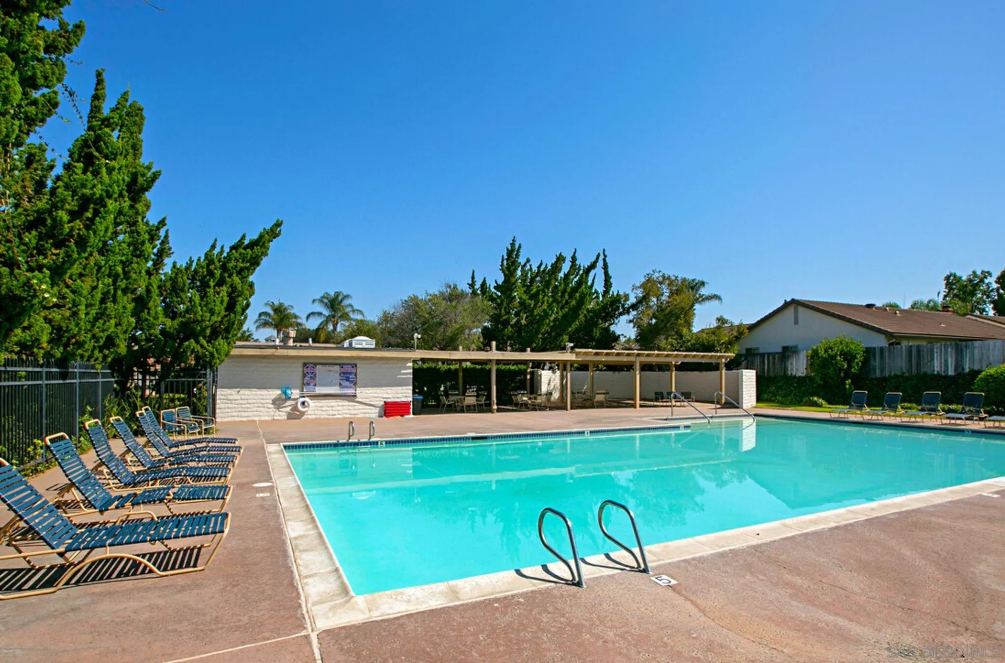 12866 Summerfield Lane Poway, CA 92064 - Photo 30 of 33 a view of a house with a swimming pool