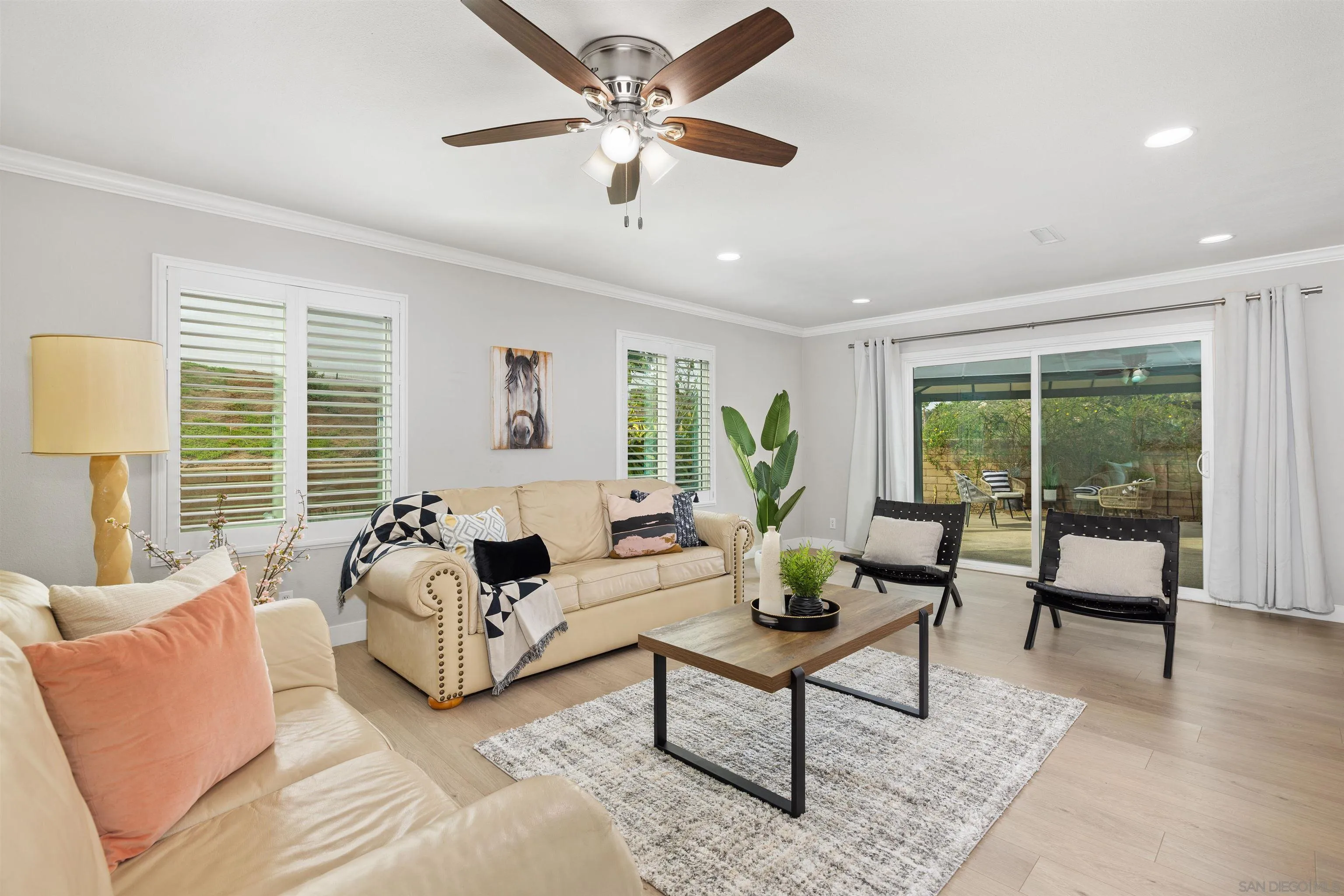12866 Summerfield Lane Poway, CA 92064 - Photo 5 of 33 a living room with furniture and a large window