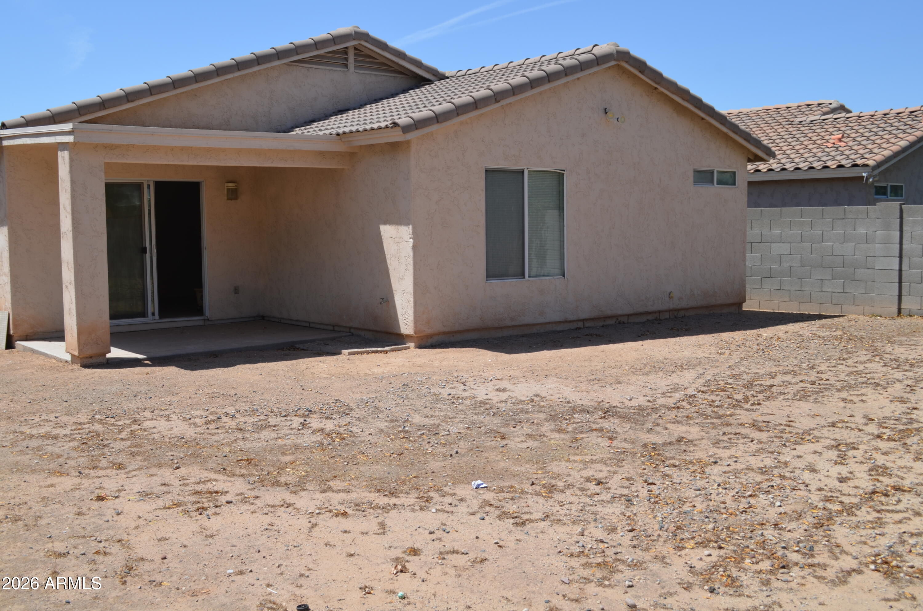 5409 South 11th Street Phoenix, AZ 85040 - Photo 12 of 17 a view of a house with a roof